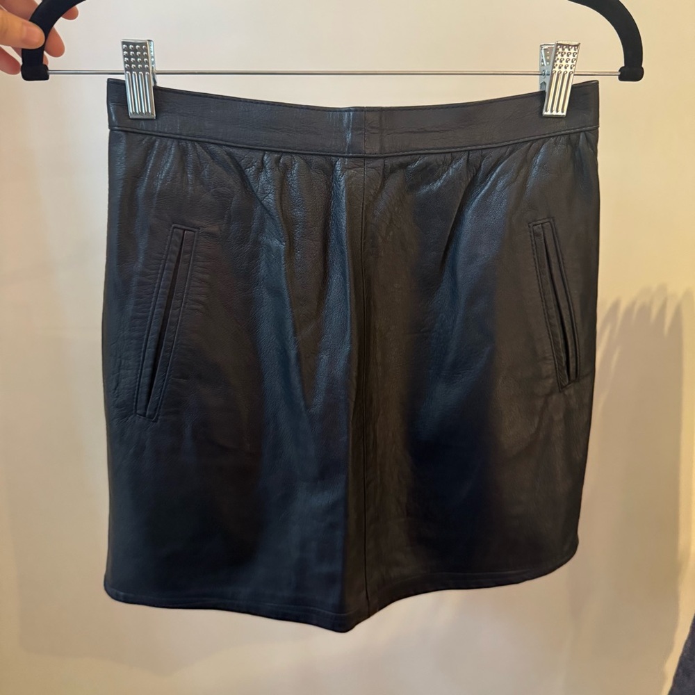Navy Leather Mini Skirt with snap, pockets, and striped lining